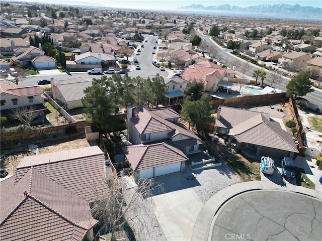 birds eye view of property featuring a mountain view