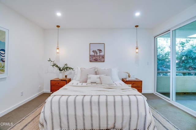 carpeted bedroom with access to outside