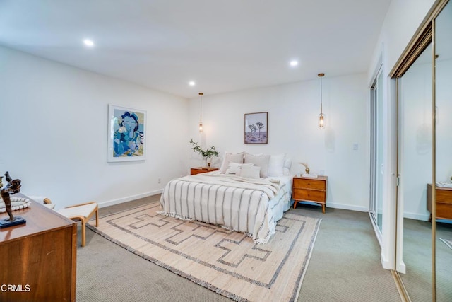 carpeted bedroom featuring a closet