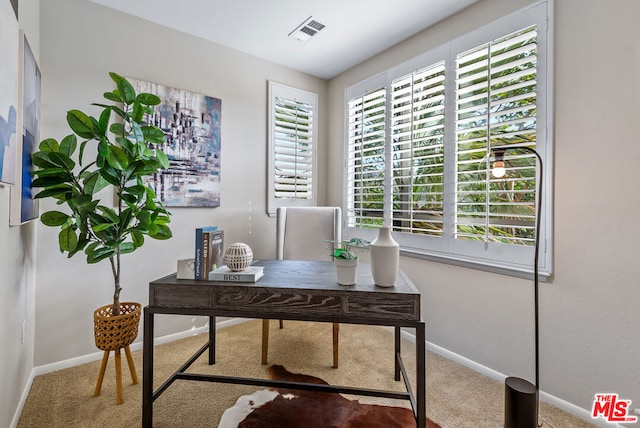 view of carpeted home office