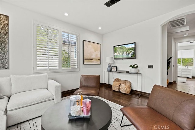 living room with hardwood / wood-style flooring