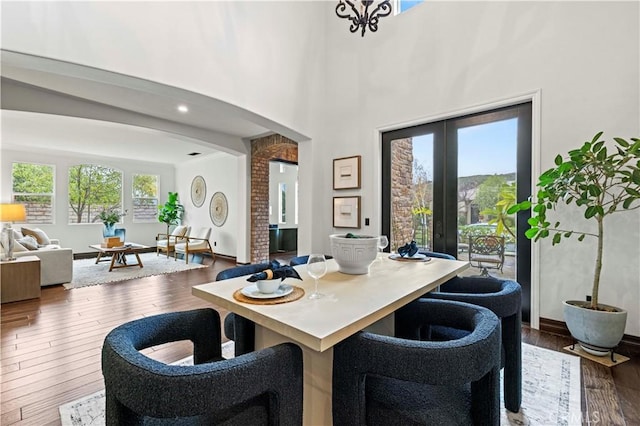 dining room featuring dark wood-type flooring and french doors