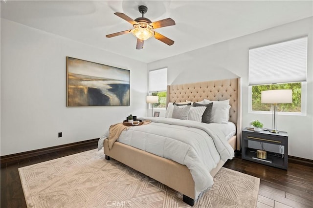 bedroom featuring hardwood / wood-style flooring and ceiling fan