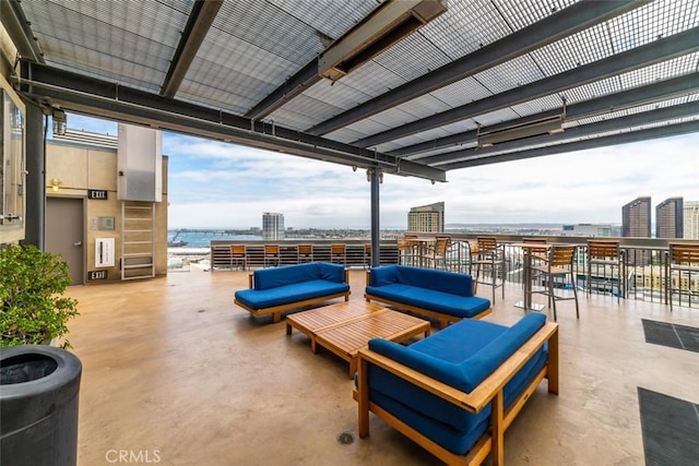 view of patio featuring a water view and an outdoor hangout area