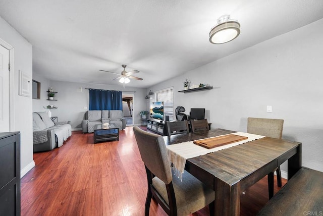 dining area featuring hardwood / wood-style floors and ceiling fan