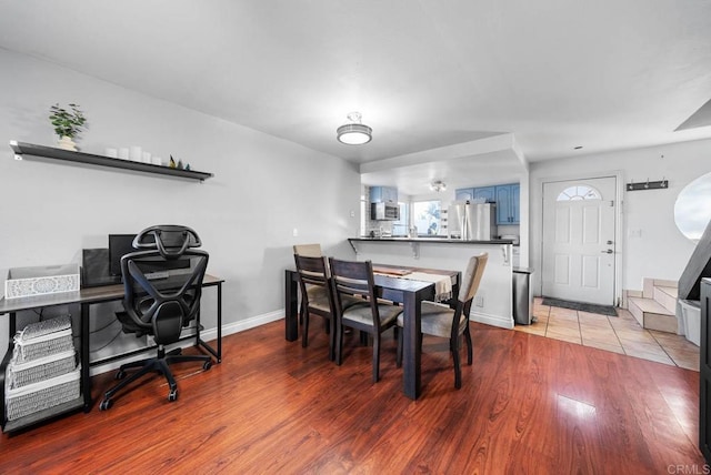 dining space featuring light hardwood / wood-style flooring