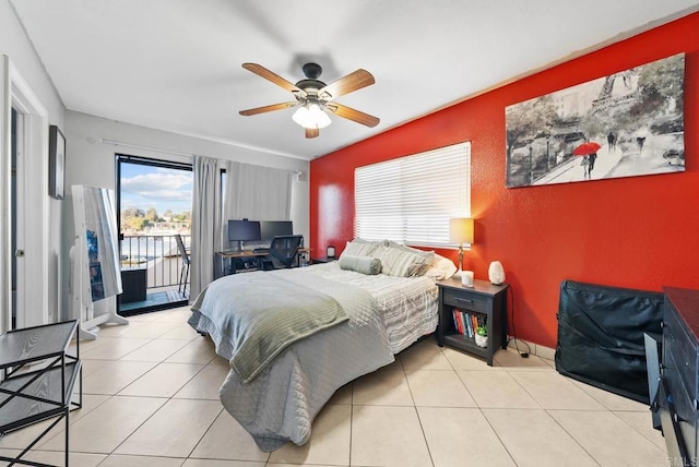 bedroom with light tile patterned flooring, access to exterior, and ceiling fan