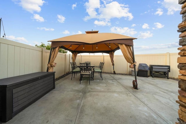 view of patio with a gazebo and area for grilling