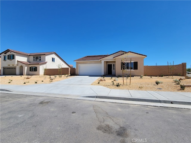 view of front of property featuring a garage