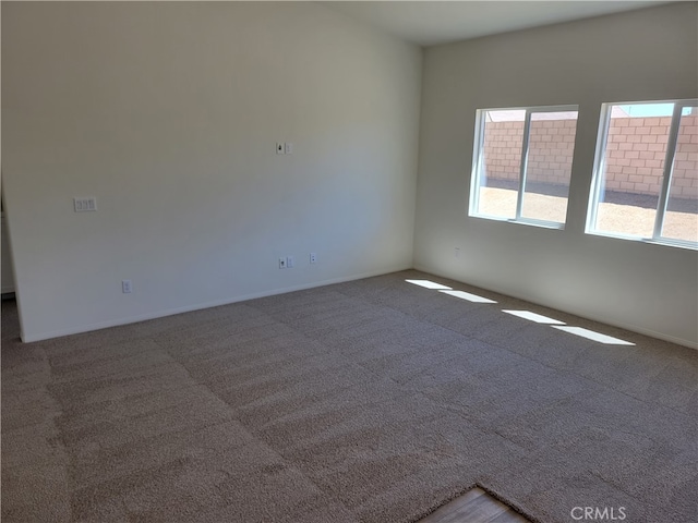 view of carpeted spare room