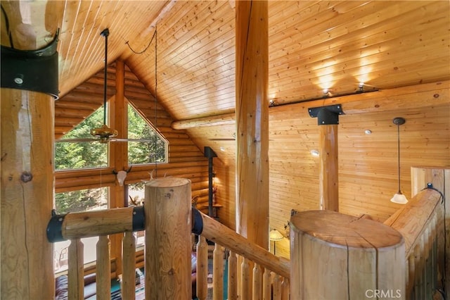 hall with wood ceiling and vaulted ceiling