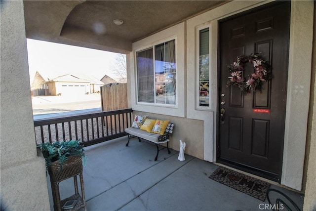 doorway to property with covered porch