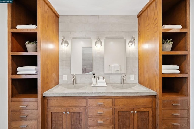 bathroom featuring vanity and built in features