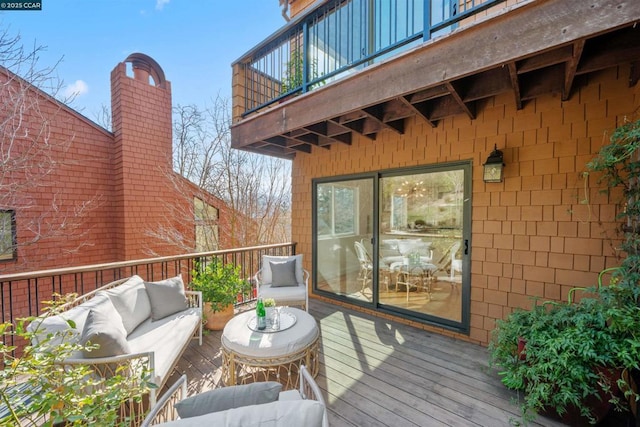 deck with an outdoor hangout area