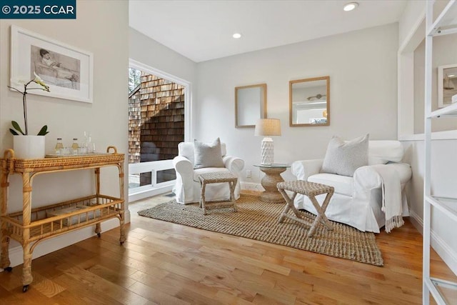 living area featuring wood-type flooring