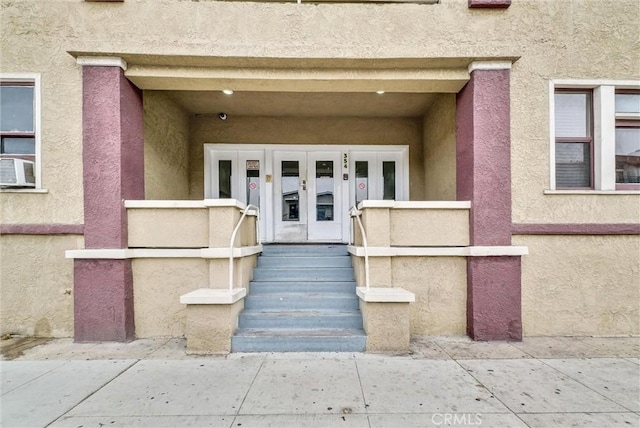 property entrance with french doors