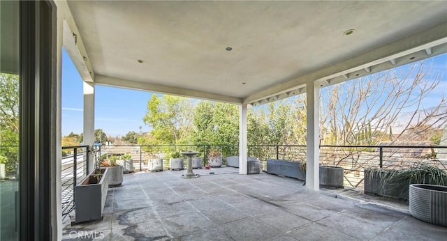 view of patio / terrace featuring a balcony