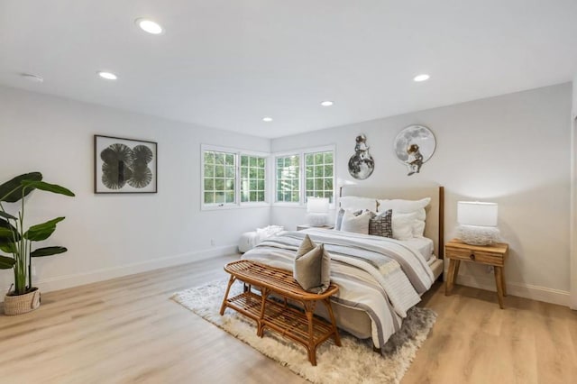 bedroom with light hardwood / wood-style floors