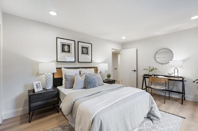 bedroom featuring light hardwood / wood-style floors