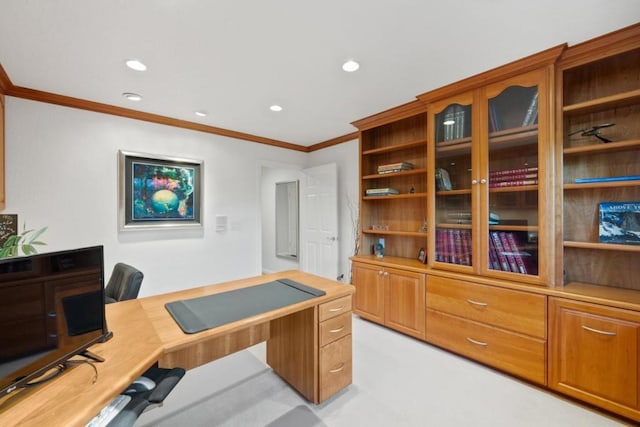 carpeted home office featuring ornamental molding