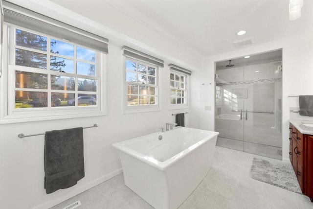 bathroom with vanity, tile patterned flooring, and separate shower and tub