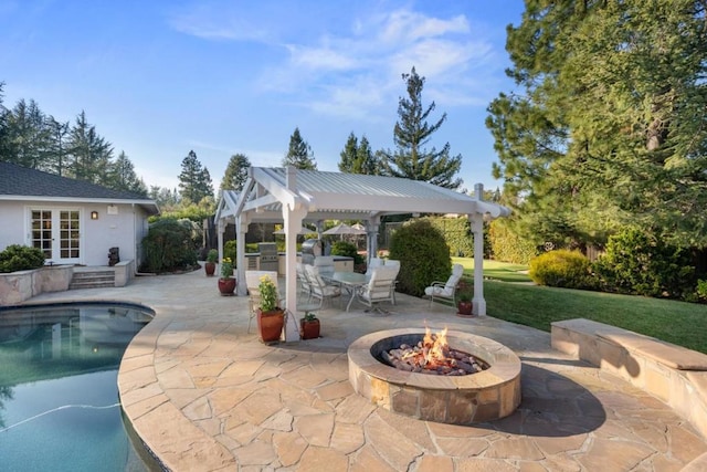 view of patio / terrace with a gazebo and an outdoor fire pit