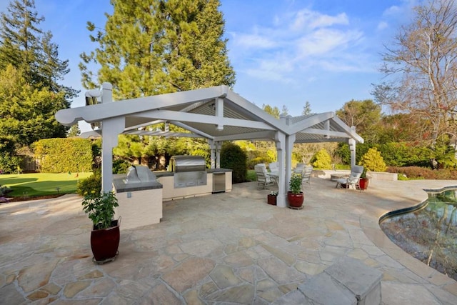 view of patio / terrace with a gazebo and area for grilling