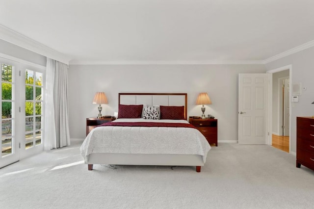 bedroom with ornamental molding, light carpet, and access to outside