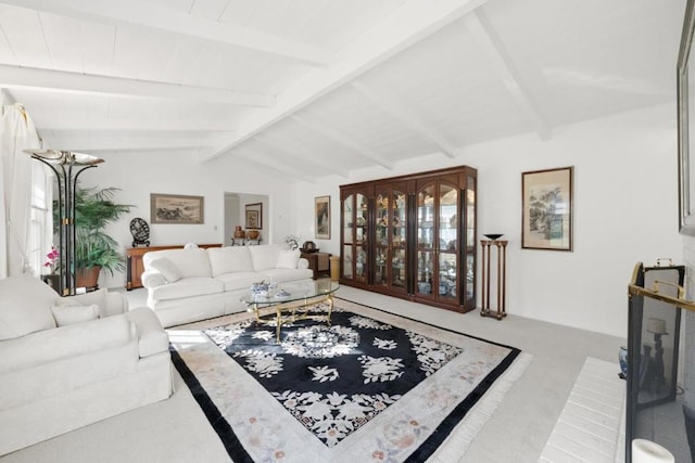 living room featuring lofted ceiling with beams