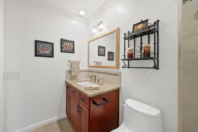 bathroom with vanity, backsplash, crown molding, and toilet