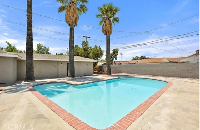 view of pool with a patio