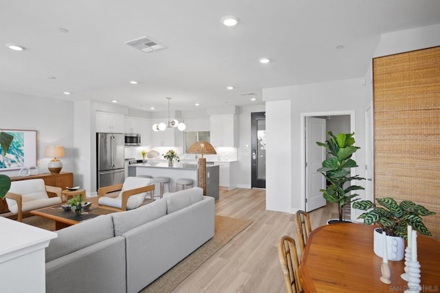 living room featuring light hardwood / wood-style flooring