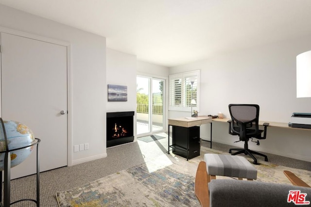 home office featuring light colored carpet