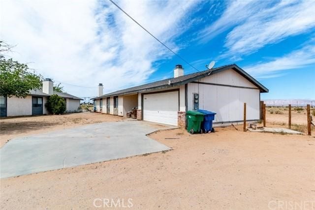 view of side of property featuring a garage