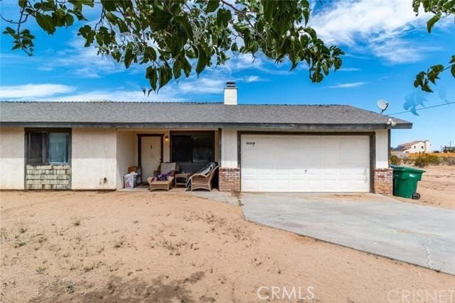 ranch-style house with a garage