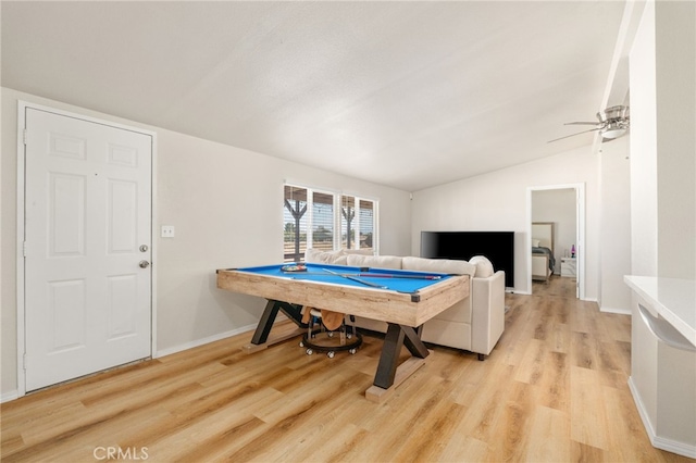 playroom with vaulted ceiling, pool table, ceiling fan, and light wood-type flooring