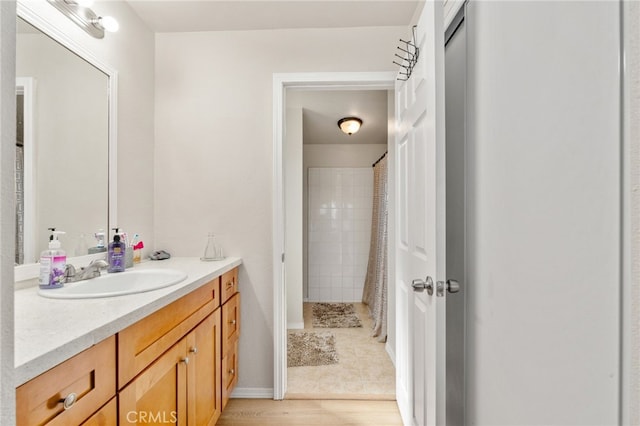 bathroom with vanity and walk in shower