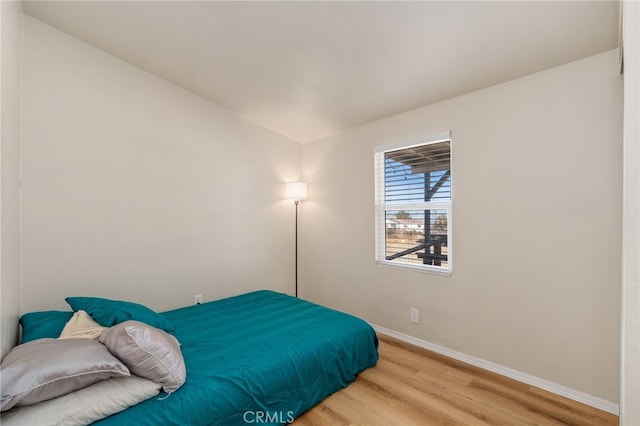 bedroom featuring hardwood / wood-style flooring