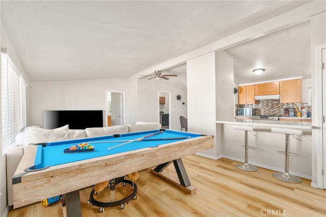 game room with vaulted ceiling, billiards, ceiling fan, and light wood-type flooring