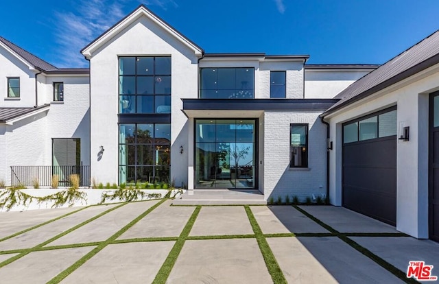 entrance to property with a patio area