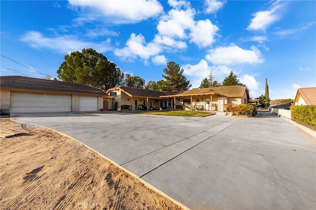 single story home featuring a garage