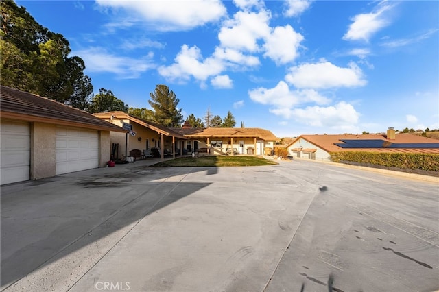 single story home featuring a garage