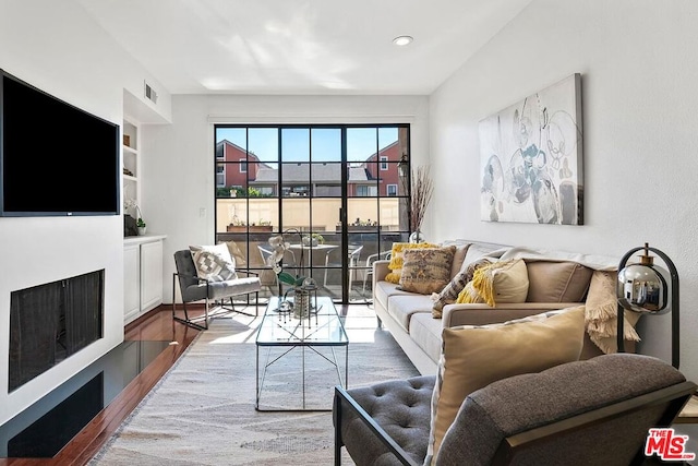 living room featuring hardwood / wood-style flooring