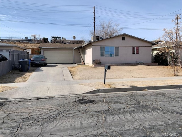 single story home featuring a garage