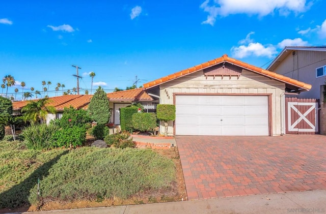 view of front of property featuring a garage