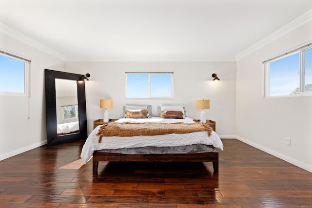 bedroom with dark wood-type flooring and ornamental molding