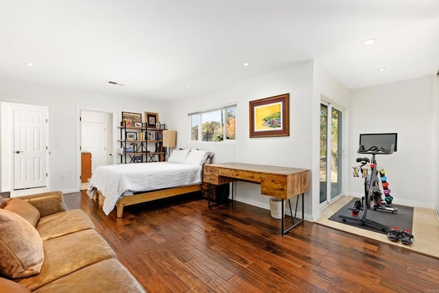 bedroom featuring access to outside and dark hardwood / wood-style floors