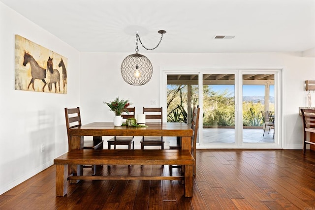 dining room featuring dark hardwood / wood-style flooring