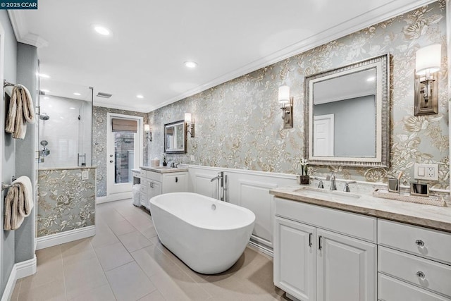 bathroom featuring vanity, tile patterned flooring, ornamental molding, and separate shower and tub