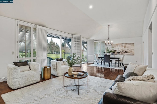 living room featuring expansive windows, dark hardwood / wood-style floors, and a chandelier